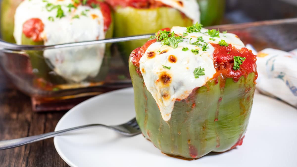 Hearty Stuffed Green Peppers with Beef, Rice & Tomatoes